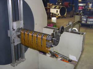 Figure 3: Class H random coils being made on a semi-automated winding machine.